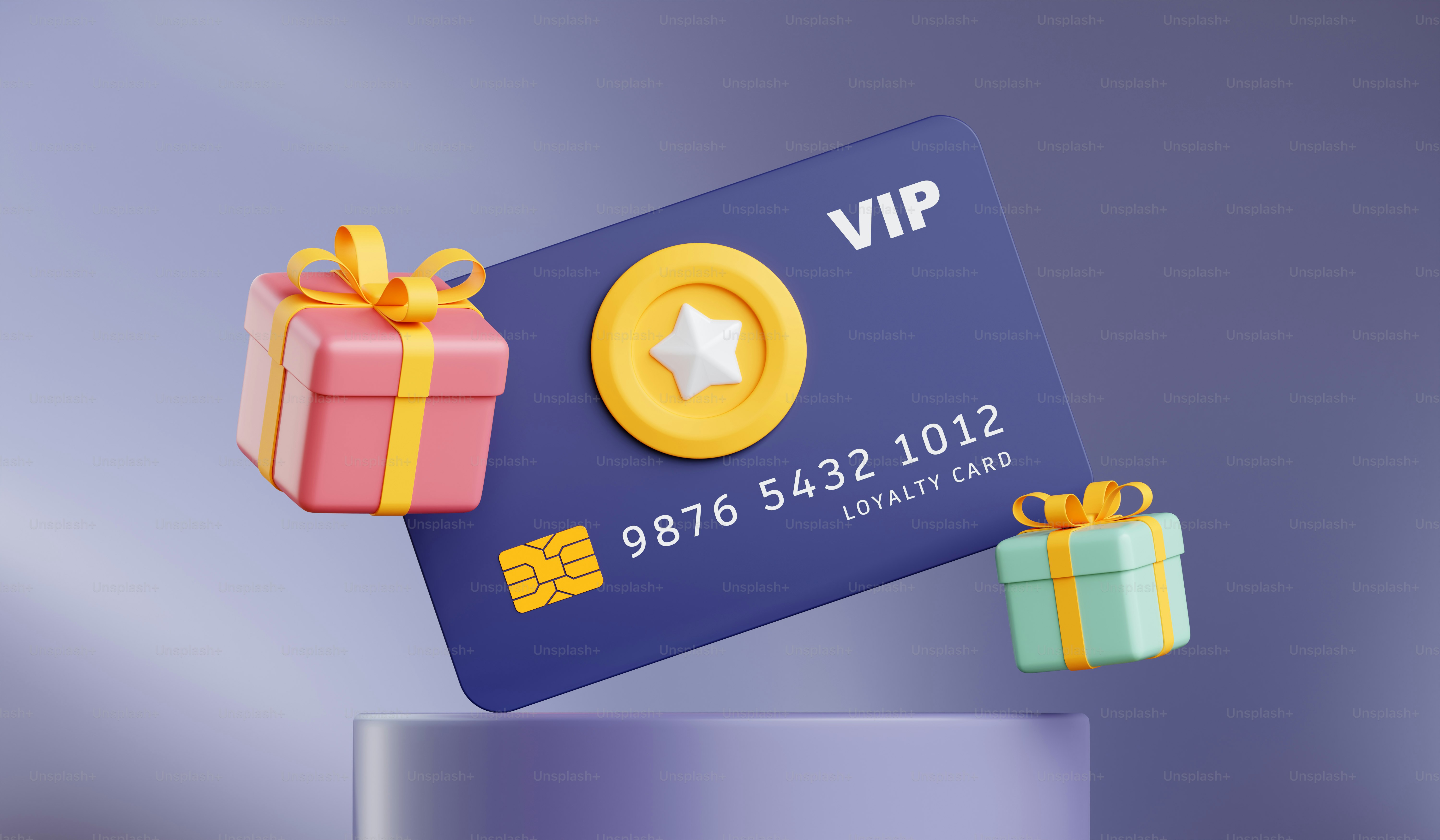 A credit card with a gift box on top of it